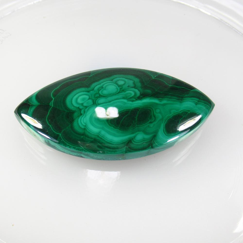 101.87 Ct Natural Green Malachite 50x27 mm Marquise Cab: No Reserve! Title: 101.87 Ct Natural Green Malachite 50x27 mm Marquise Cab Clarity: Opaque Gemstone: Natural Malachite Carat Weight: 101.83 Size/Dimensions: 50.00 x 27.00 x 6.90 mm Additional Informat