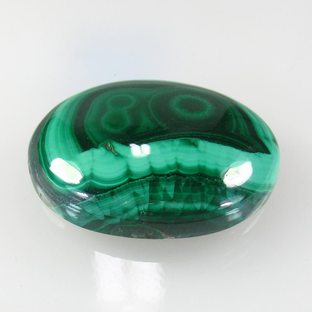 51.41 Ct Natural Green Malachite 30x20 mm Oval Cab: No Reserve! Title: 51.41 Ct Natural Green Malachite 30x20 mm Oval Cab Clarity: Opaque Gemstone: Natural Malachite Carat Weight: 51.41 Size/Dimensions: 30.00 x 20.00 x 6.80 mm Additional Information: N
