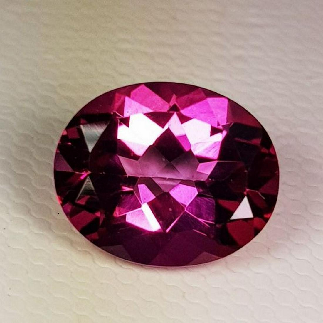 4.08 ct Natural Pink Topaz Oval Cut: No Reserve! Title: 4.08 ct Natural Pink Topaz Oval Cut Color/Clarity: VVS Carat Weight: 4.08 Size/Dimensions: 10.00 x 9.00 x 5.40 Additional Information: Oval - Brazil Shipping: Domestic: Flat-rate o