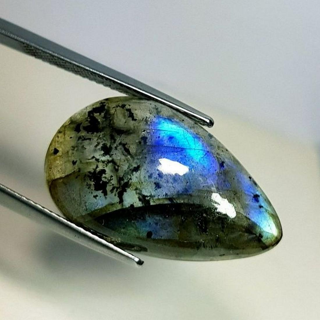 17.38 ct Natural Labradorite: No Reserve! Title: 17.38 ct Natural Labradorite Color/Clarity: Opaque Carat Weight: 17.38 Size/Dimensions: 25.30 x 15.10 x 6.10 Additional Information: Pear - USA Shipping: Domestic: Flat-rate of $10