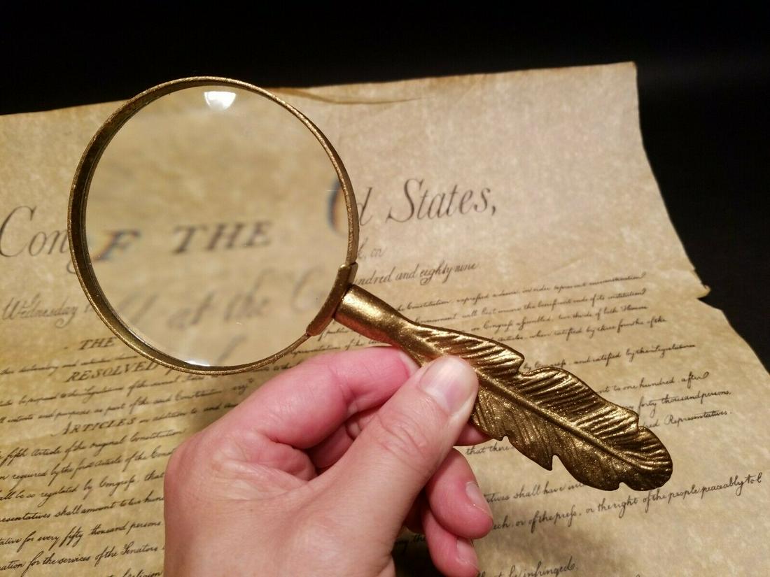 Metal Leaf Magnifying Glass: 8 1/8" Long x 3 5/8" Wide Wonderful reproduction vintage metal magnifying glass. Nice heavy quality piece all metal. Unsure of the metal used. It seems to be painted and it fairly heavy. The magnifica