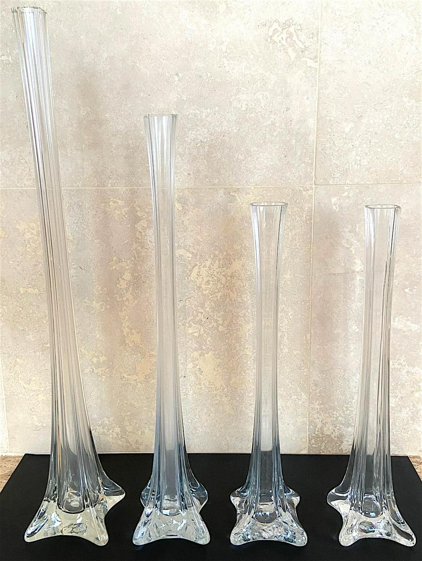 ACC Long Stem Glass Vases Set of 4: Beautiful AAC handcrafted Art Glass bud vase with decorative square base. Tag reads, AAC, Handcrafted, Made in China. No chips, cracks or breaks. In very good condition. Dimension: (1) Extra Large Vas