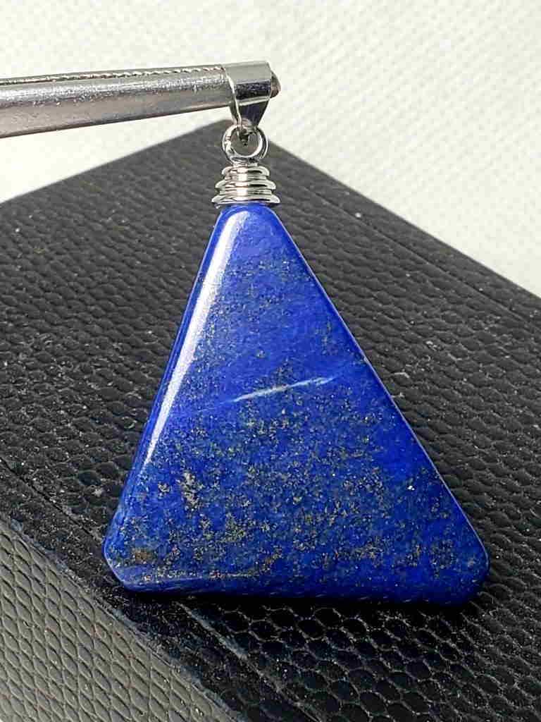 Sterling Silver Lapis Lazuli Pendant: Title: Sterling Silver Lapis Lazuli Pendant Gemstones: Mineral Size/Dimensions: 40X32X8 mm Additional Info: Sterling Silver Lapis Lazuli Pendant Reserve: $15.00 Shipping: Domestic: Flat-rate of $23.00