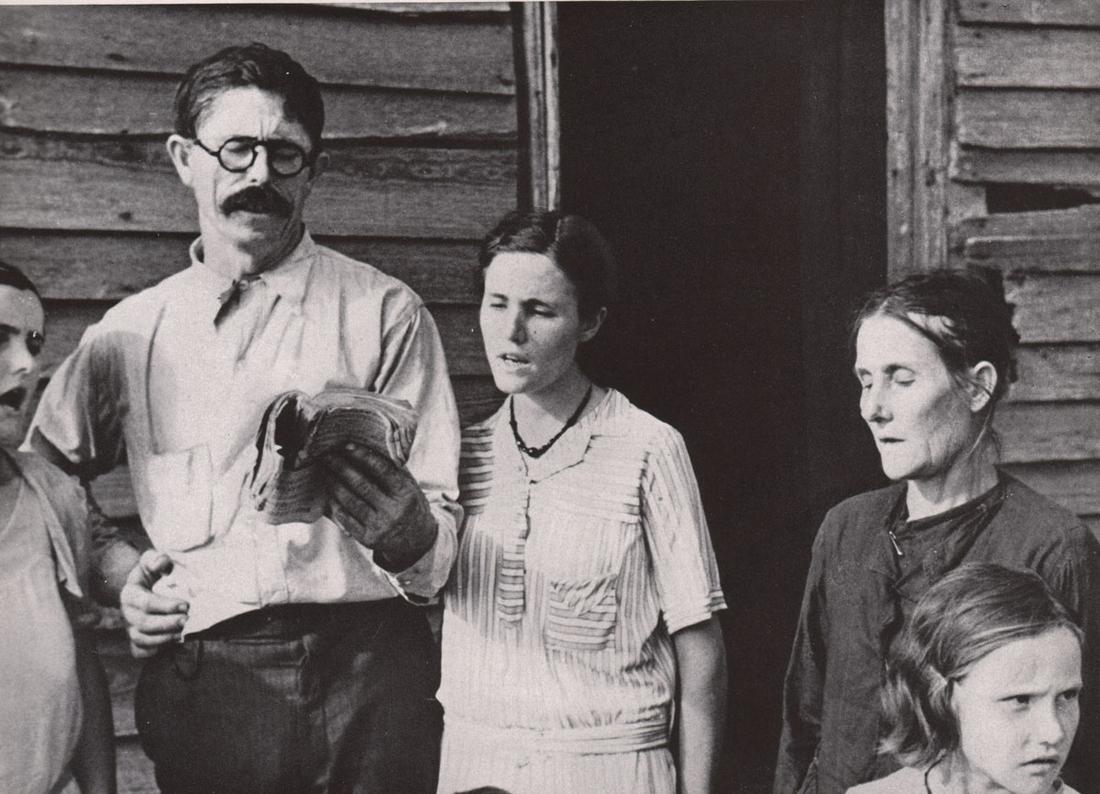 WALKER EVANS - Alabama Tenant Farmer family singing: Artist: WALKER EVANS Print Title: Alabama Tenant Farmer family singing hymns, 1936 Printing Date: 1930’s Medium: Photoengraving Printed in: the USA Image Size: 5 x 7” Walker Evans(1903–1975) was