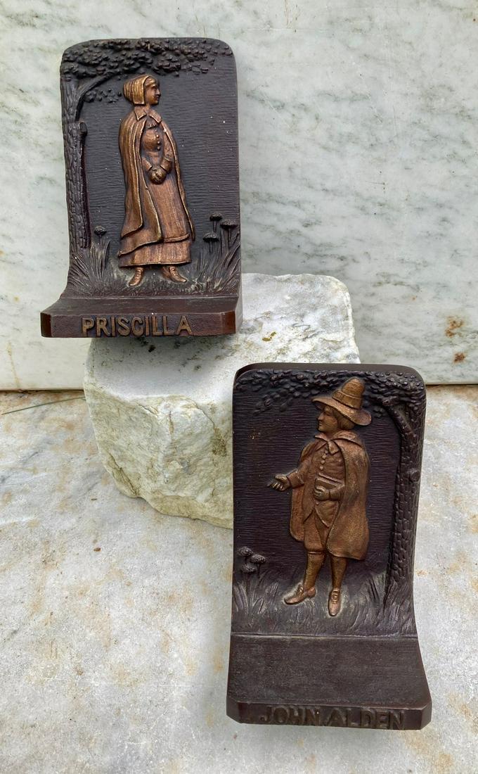 Pr. B & H heavy cast iron John and Priscilla Alden: Title: Pr. B & H heavy cast iron John and Priscilla Alden bookends Origin: Dimension: 6” high x 3 3/4” wide Provenance/Additional Info: Original finish Shipping: Domestic: Flat-rate of $15.00 to a