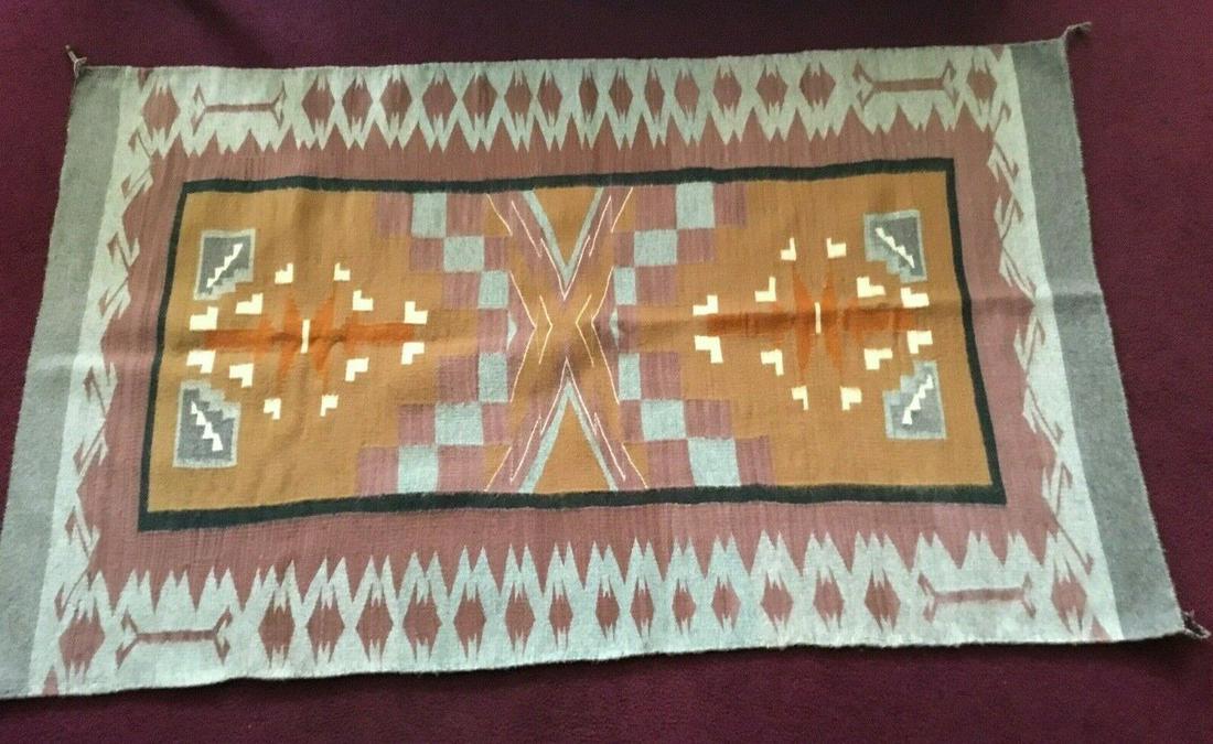 Native American Navajo New Mexico, Arizona American Rug: For sale is a lovely Navajo rug. Sorry I lost the tag so I am not sure of the pattern. The rug is in very good condition it is approximately 60 1/2” long 37 1/2” wide I will be selling 7 Navajo so