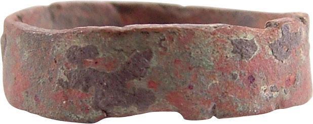 RARE COPPER VIKING RING, 900-1050 AD JEWELRY S 7 ¼: No Reserve! Size 7 ¼. 5.4mm width with a flat face. As found with red copper patina and green encrustation from burial. Vikings were expert metallurgists. The use of pure copper is rare and suggests 