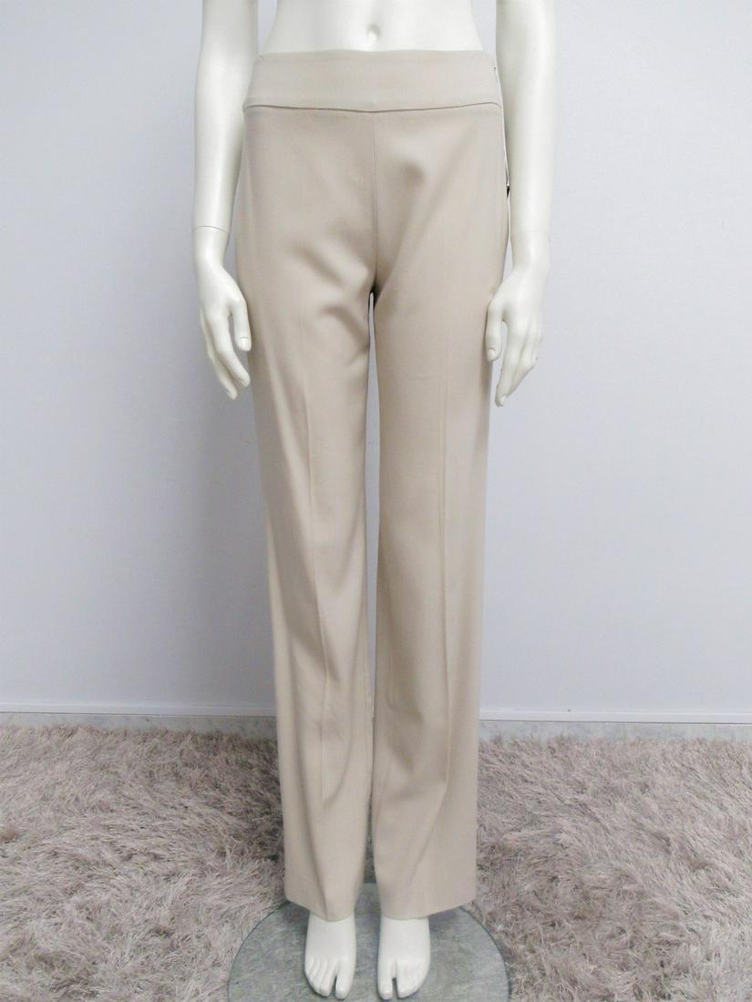 "Rena Lange" Wide trousers in beige virgin wool blend: Title: "Rena Lange" Wide trousers in beige virgin wool blend Size S Materials: 75% virgin wool, 23% cupro, 2% elastam Measurement: SIZE: 34 DE. Fit "S"MEASURES: Waist 36 cm (14.17 "), horse 29 cm (11.