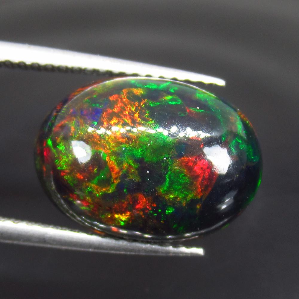 4.92 Ct Natural Ethiopian Black Fire Opal Oval Cab (1 of 2)