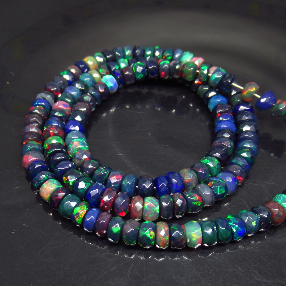 46.61 Ct Natural 158 Drilled Faceted Black Fire Opal: Title: 46.61 Ct Natural 158 Drilled Faceted Black Fire Opal Beads Stone Clarity: Translucent Gemstones: Natural Faceted Black Opal Beads Carat Weights: 46.61 Size/Dimensions: 4.60 to 4.80 mm / 158 PC'