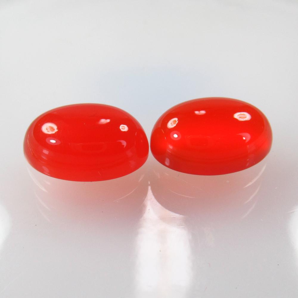 12.63 Ct Natural Orange Carnelian Oval Pair: Title: 12.63 Ct Natural Orange Carnelian Oval Pair Stone Clarity: Semi-Transparent Gemstones: Natural Carnelian Carat Weights: 12.63 Size/Dimensions: 14.20 x 10.00 x 6.00 mm / 2 PC's Additional Inform