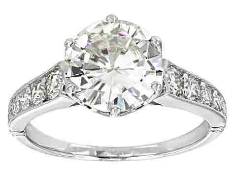 GRA Certified Moissanite 2.42 ctw 14Kt White Gold: Title: GRA Certified Moissanite 2.42 ctw 14Kt White Gold Brand: Jewelick Metal Purity: 14KT GOLD Gemstone: Moissanite Carat Weight: 2.42 Size/Dimension:US-7 Additional Information:GRA Certified Reserv