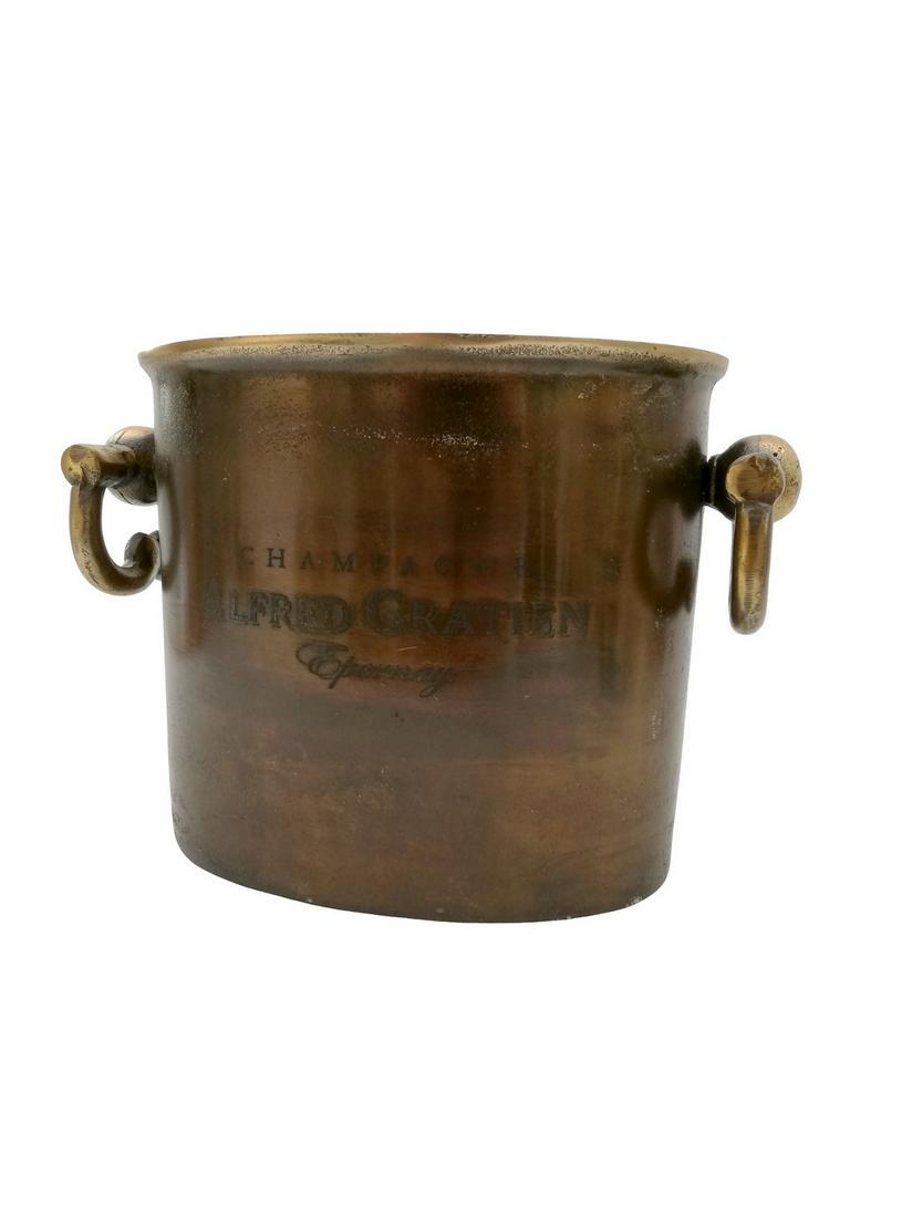 Champagne Alfred Gratien - Wine Cooler/Champagne: Title: Champagne Alfred Gratien - Wine Cooler/Champagne cooler/champagne ice bucket - Brass Maker: Alfred Gratien Origin: France Date/Period: 1975-1980 Materials:Brass Dimensions:Width: +- 10 inch Hei
