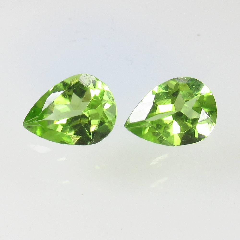 2.03 Ct Natural Pakistan Peridot Pear Pair: No Reserve! Title: 2.03 Ct Natural Pakistan Peridot Pear Pair Stone Clarity: VVS Gemstone: Natural Peridot Carat Weight: 2.03 Size/Dimensions: 8.00 x 5.80 x 3.60 mm / 2 PC's Additional Information: To