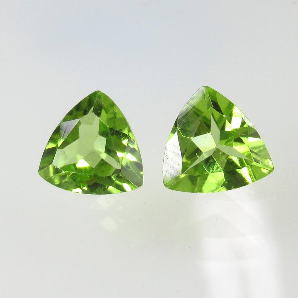 2.00 Ct Natural Pakistan Peridot Trillion Pair: No Reserve! Title: 2.00 Ct Natural Pakistan Peridot Trillion Pair Stone Clarity: VVS Gemstone: Natural Peridot Carat Weight: 2.00 Size/Dimensions: 7.10 x 7.10 x 3.50 mm / 2 PC's Additional Information