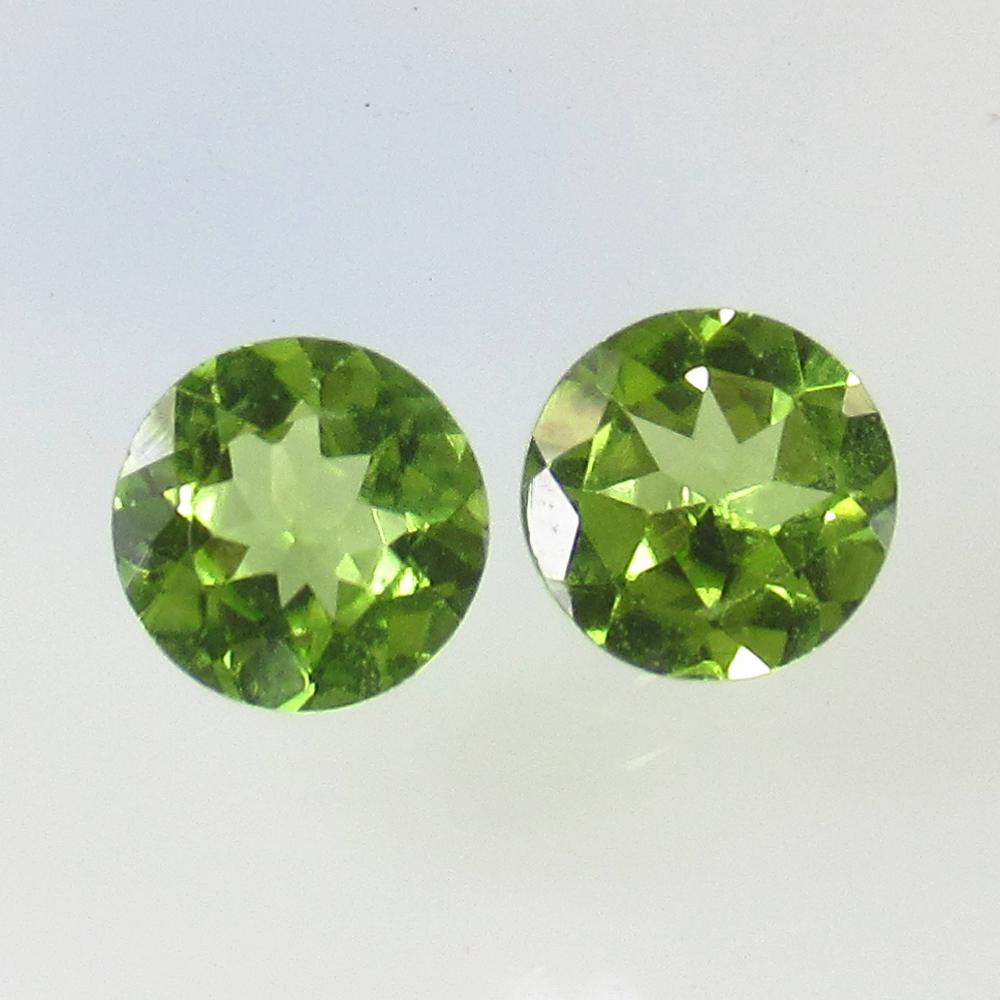 2.34 Ct Natural Pakistan Peridot Round Pair: No Reserve! Title: 2.34 Ct Natural Pakistan Peridot Round Pair Stone Clarity: VVS Gemstone: Natural Peridot Carat Weight: 2.34 Size/Dimensions: 7.00 x 7.00 x 3.80 mm / 2 PC's Additional Information: T