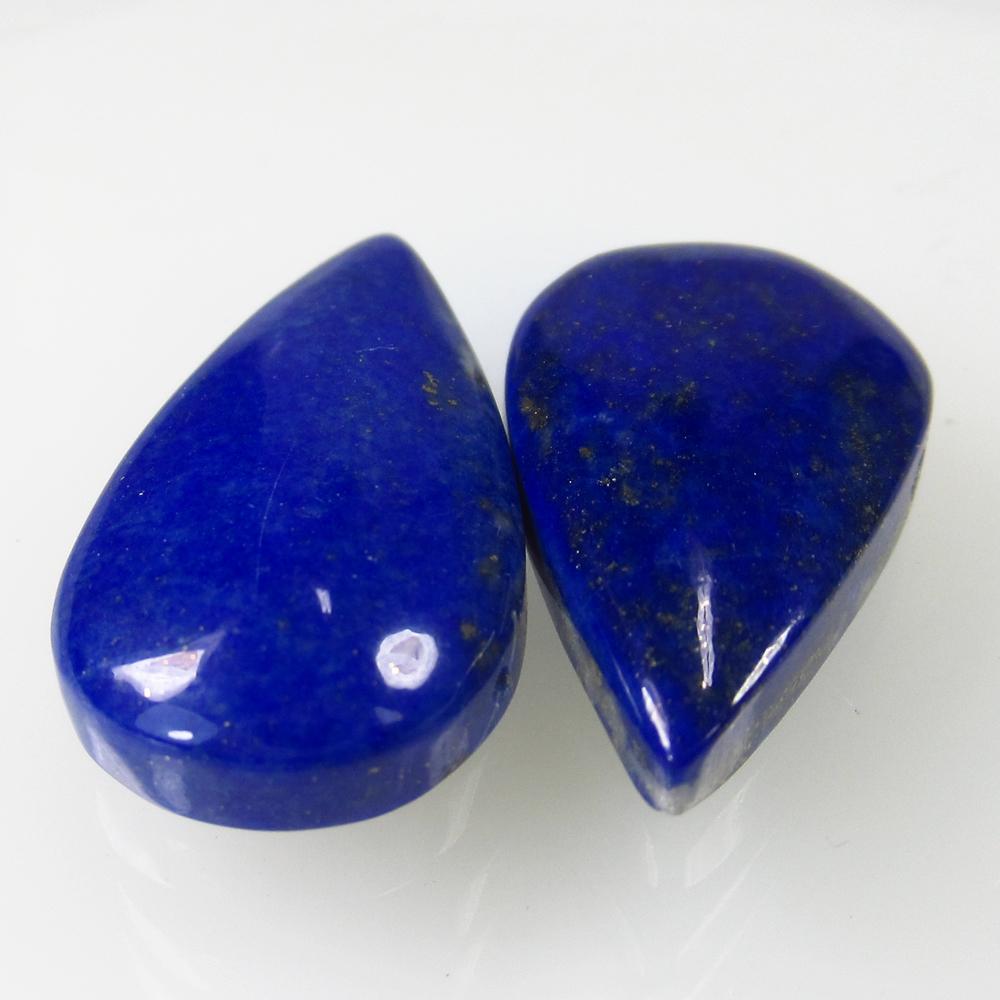 22.09 Ct Natural Lapis Lazuli Pear Pair: No Reserve! Title: 22.09 Ct Natural Lapis Lazuli Pear Pair Stone Clarity: Opaque Gemstone: Natural Lapis Lazuli Carat Weight: 22.09 Size/Dimensions: 21.50 x 12.50 x 5.00 mm / 2 PC's Additional Informa