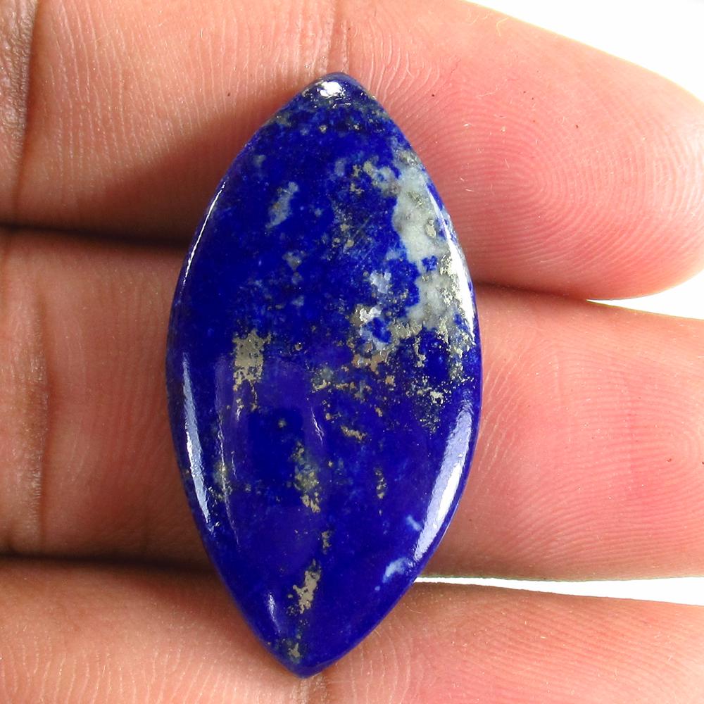 23.00 Ct Natural Lapis Lazuli 35x17mm Marquise Cab: No Reserve! Title: 23.00 Ct Natural Lapis Lazuli 35x17mm Marquise Cab Stone Clarity: Opaque Gemstone: Natural Lapis Lazuli Carat Weight: 23.00 Size/Dimensions: 35.00 x 17.10 x 4.80 mm Additional Infor