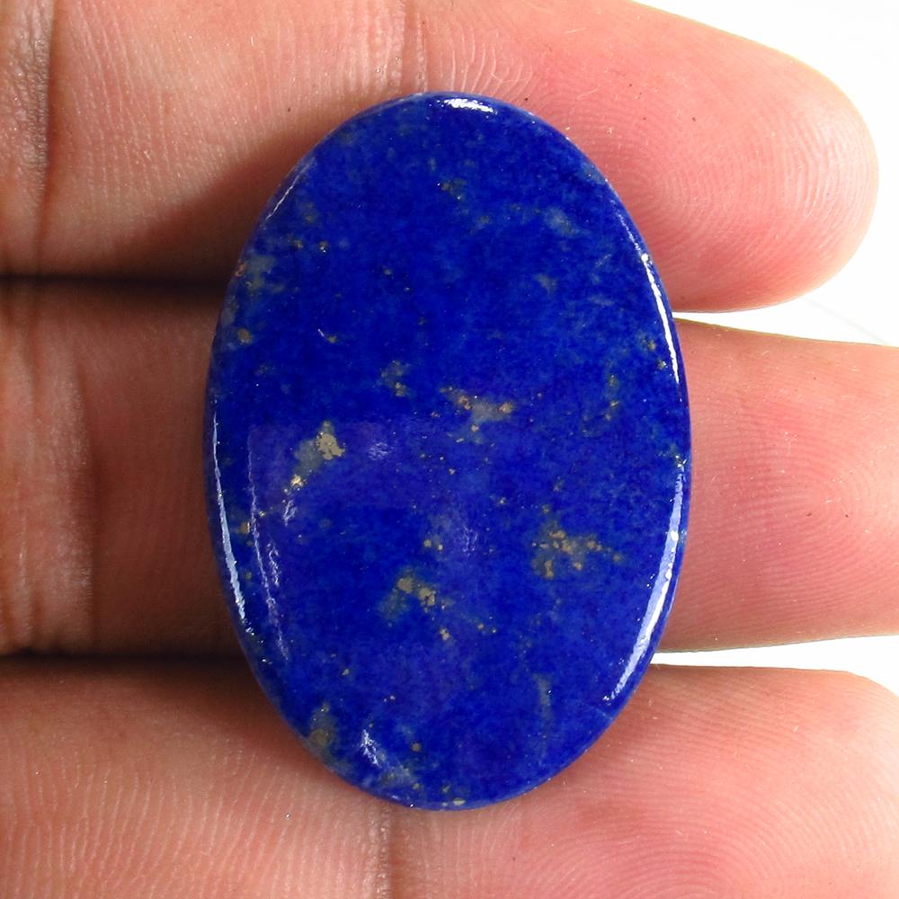 40.20 Ct Natural Lapis Lazuli 35x24mm Oval Cab: No Reserve! Title: 40.20 Ct Natural Lapis Lazuli 35x24mm Oval Cab Stone Clarity: Opaque Gemstone: Natural Lapis Lazuli Carat Weight: 40.20 Size/Dimensions: 35.00 x 24.00 x 4.80 mm Additional Informati