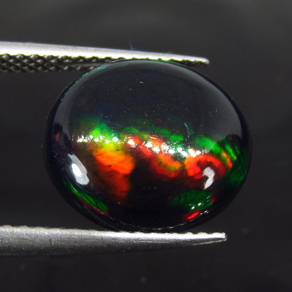 2.97 Ct Natural Ethiopian Black Fire Opal Oval Cab (1 of 3)