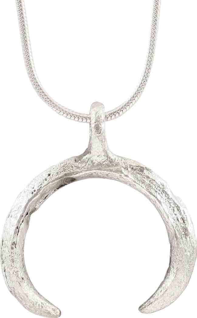 VIKING LUNAR PENDANT NECKLACE C.900-1000 AD JEWELRY: Well over 7/8” width of thick form, ridged front, back and edge. As expert navigators, the constellations signified mystery and power to Vikings. The Moon was personified as Mani, brother to Sol the
