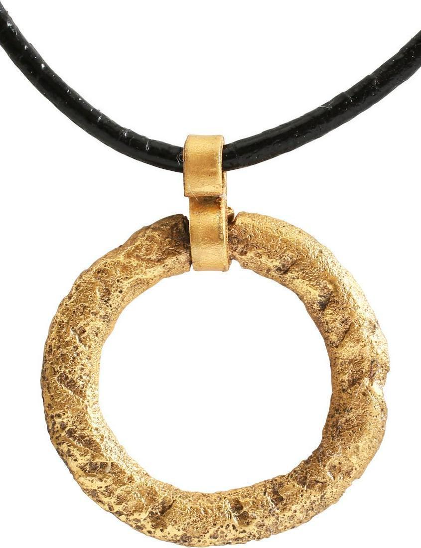 VIKING PROTECTIVE BROOCH NECKLACE PENDANT 10th CENTURY: Circular bronze, just over 1” diameter with rounded front modeled as a wreath and flat back forming a ridged edge. The surface textured from burial. Professionally conserved and the 24karat gold sur