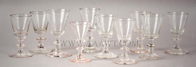 Wineglass Collection, Blown Clear Glass, Single Wafer: 424-185 Wineglass Collection, Blown Clear Glass, Single Wafer Knop, Funnel Bowls Lot of Ten; Anonymous Circa 1780 to 1820 Average height is 4", some with folded foot, pontiled, clean Reserve: