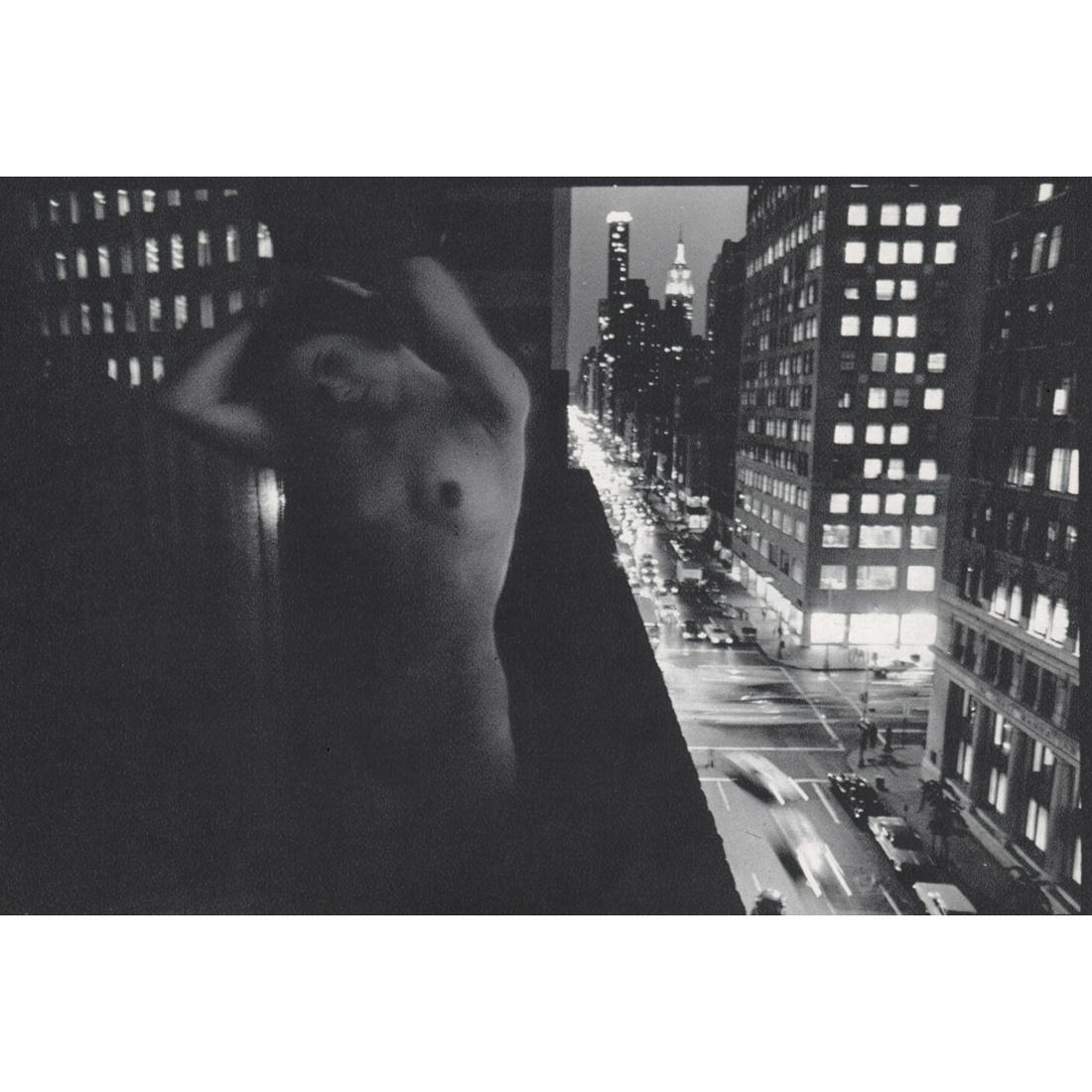 DUANE MICHALS - Female Nude on a Balcony, NYC: Artist: DUANE MICHALS Print Title: Female Nude on a Balcony, NYC Medium: Sheet-fed Gravure Printing date: 1970's Printed in Switzerland Image Size approx: 5 X 7.25 inches Duane Michals (b. 1932) is an