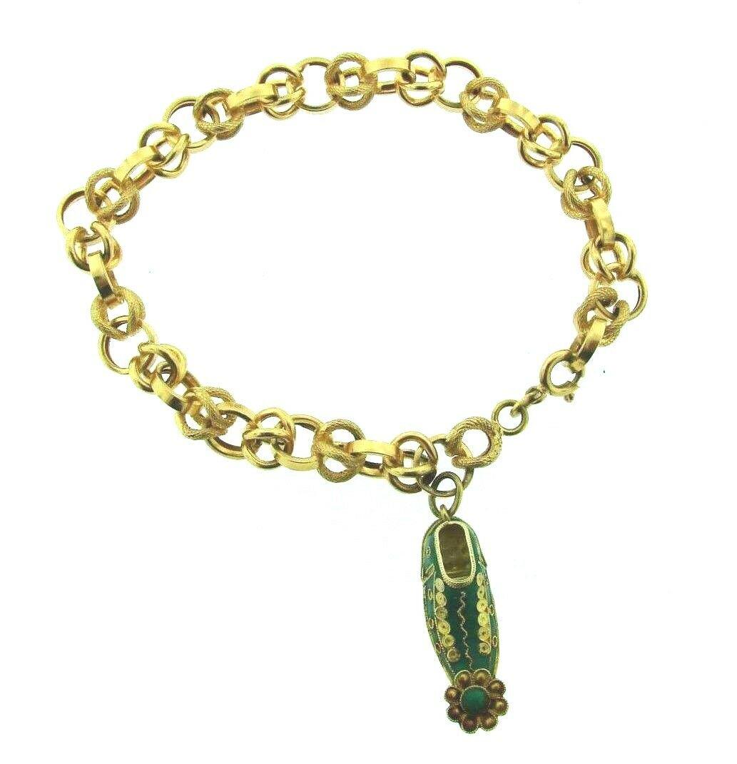 LOVELY 18k Yellow Gold & Enamel Shoe Charm Link: DK 18k Yellow Gold & Enamel Link Bracelet with Charm Â· Wonderful bracelet that is a necessity in your collection. Â· The weight is 11.4 gram. Â· The length of the chain is 8 inches. The length 
