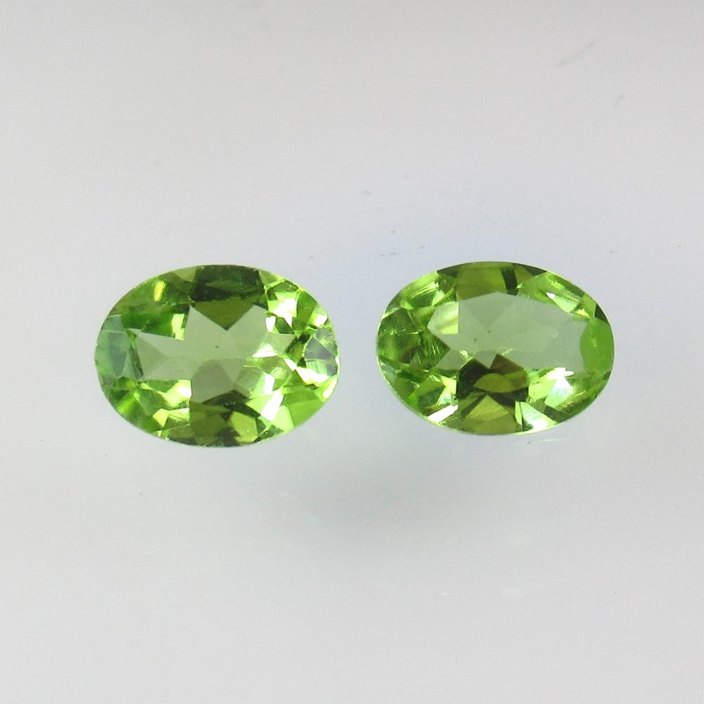 2.22 Ctw Natural Pakistan Peridot Oval Pair: No Reserve! Title: 2.22 Ctw Natural Pakistan Peridot Oval Pair Stone Clarity: VVS Gemstone: Peridot Carat Weight: 2.22 Size/Dimensions: 8.00 x 6.00 x 3.30 mm / 2 PC's Additional Information: Top Class