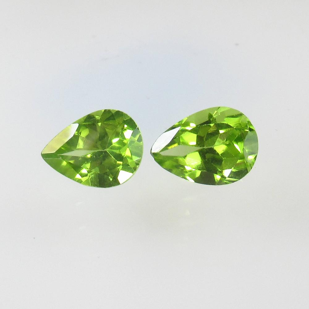 2.29 Ctw Natural Pakistan Peridot Pear Pair: No Reserve! Title: 2.29 Ctw Natural Pakistan Peridot Pear Pair Stone Clarity: VVS Gemstone: Peridot Carat Weight: 2.29 Size/Dimensions: 7.90 x 6.00 x 3.70 mm / 2 PC's Additional Information: Top Class