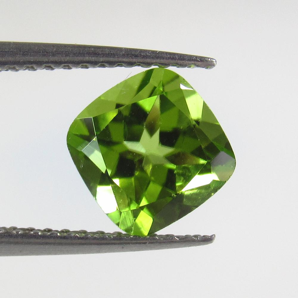 1.90 Ctw Natural Pakistan Peridot Cushion Cut: No Reserve! Title: 1.90 Ctw Natural Pakistan Peridot Cushion Cut Stone Clarity: VVS Gemstone: Peridot Carat Weight: 1.9 Size/Dimensions: 7.10 x 7.10 x 5.00 mm Additional Information: Top Class Luster 