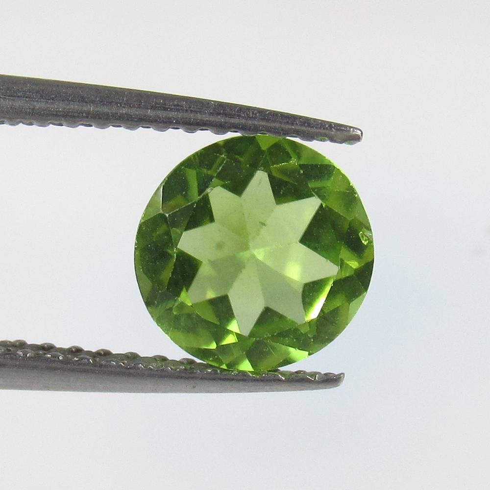 1.29 Ctw Natural Pakistan Peridot Round Cut: No Reserve! Title: 1.29 Ctw Natural Pakistan Peridot Round Cut Stone Clarity: VVS Gemstone: Peridot Carat Weight: 1.29 Size/Dimensions: 7.20 x 7.20 x 3.90 mm Additional Information: Top Class Luster /