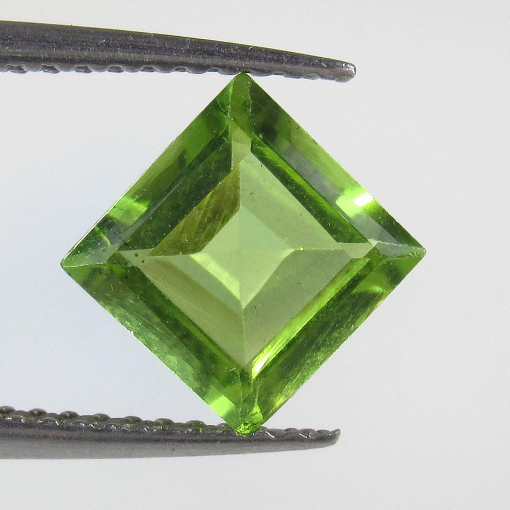 1.56 Ctw Natural Pakistan Peridot Square Cut: No Reserve! Title: 1.56 Ctw Natural Pakistan Peridot Square Cut Stone Clarity: VVS Gemstone: Peridot Carat Weight: 1.56 Size/Dimensions: 7.00 x 7.00 x 3.80 mm Additional Information: Top Class Luster 
