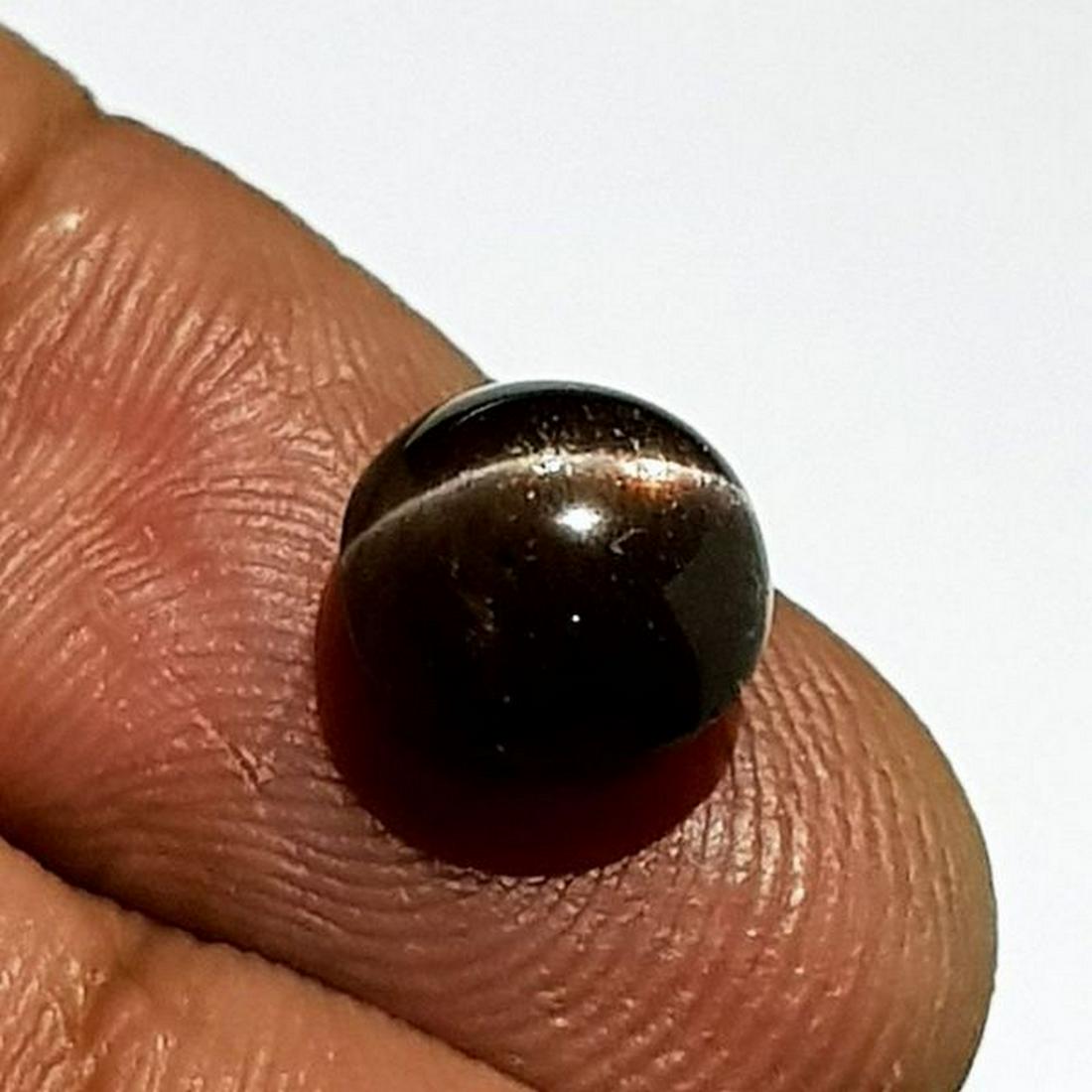 Natural Scapolite Cat's Eye 3.06 ct: No Reserve! Title: Natural Scapolite Cat's Eye 3.06 ct Color/Clarity: Opaque Gemstones: Loosegemstone Carat Weights: 3.06 Size/Dimensions: 8.40 x 8.40 x 5.90 Additional Information: Round - Srilanka S