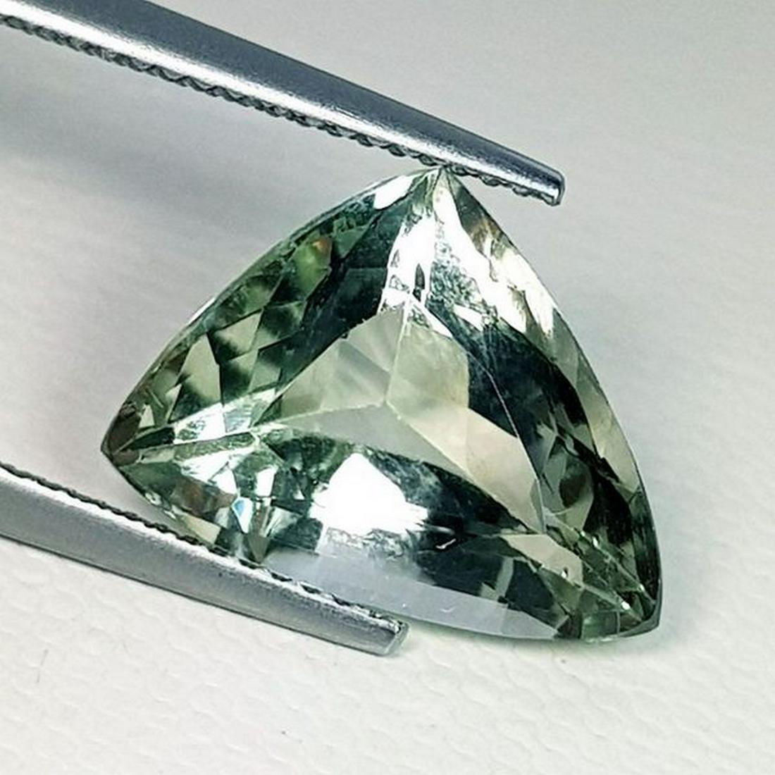 Natural Green Amethyst Triangle Cut 6.00 ct: No Reserve! Title: Natural Green Amethyst Triangle Cut 6.00 ct Color/Clarity: IF - VVS Gemstones: Gemstones Carat Weights: 6 Size/Dimensions: 14.00 x 11.40 x 7.40 Additional Information: Triangle - Br