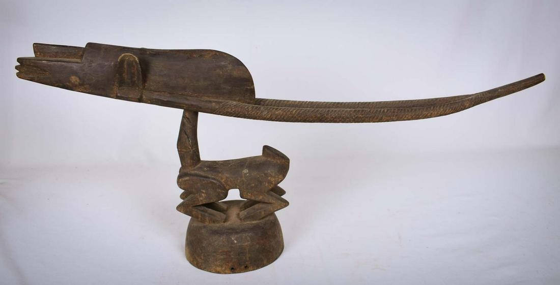 Ci-wara Headdress – Wood – Bambara – Mali: Bambara carvers have established a reputation for the zoomorphic headdresses worn by Chi-Wara society members. Although they are all different, they all display a highly abstract body, often incorpora