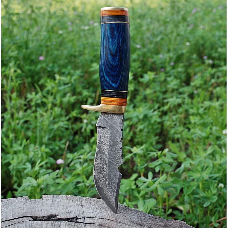 Damascus steel knife,with leather sheath, wood and: Knife "Traffiker" made of damask steel. Handle – wood, brass, scabbard - leather. Damascus knives are very durable, look great and keep sharpness perfectly. Damascus steel has high quality contents 