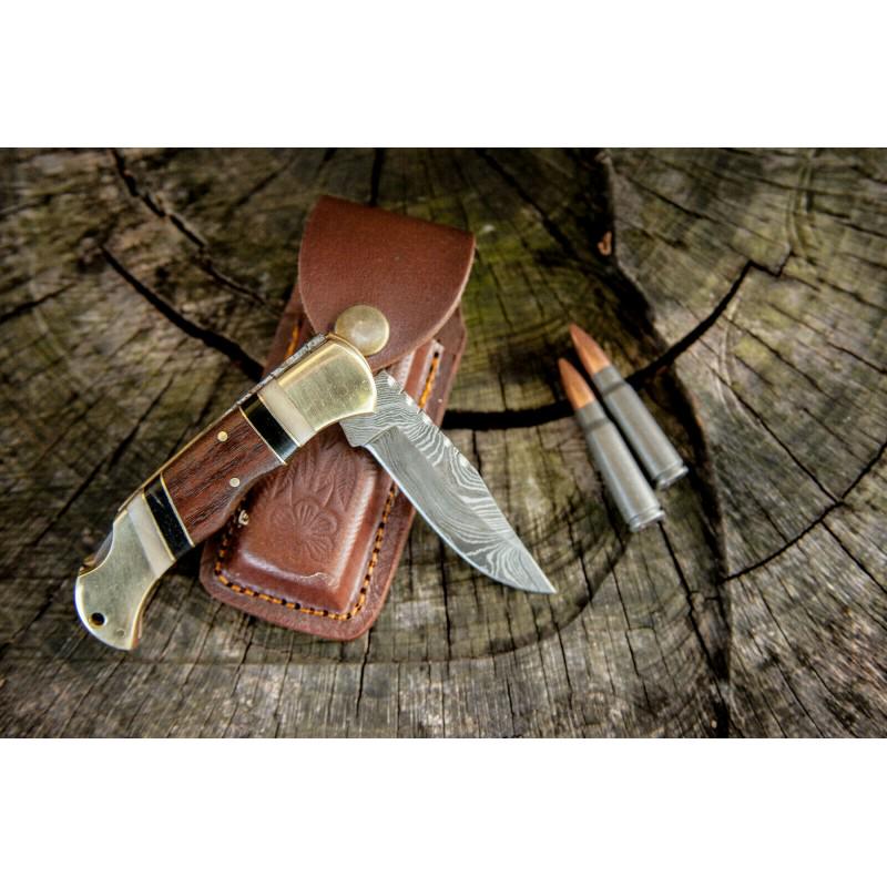 Damascus steel knife, with leather sheath, walnut wood: Knife "Breadwinner" made of damask steel. Handle – walnut wood, scabbard - leather. Damascus knives are very durable, look great and keep sharpness perfectly. Damascus steel has high quality content