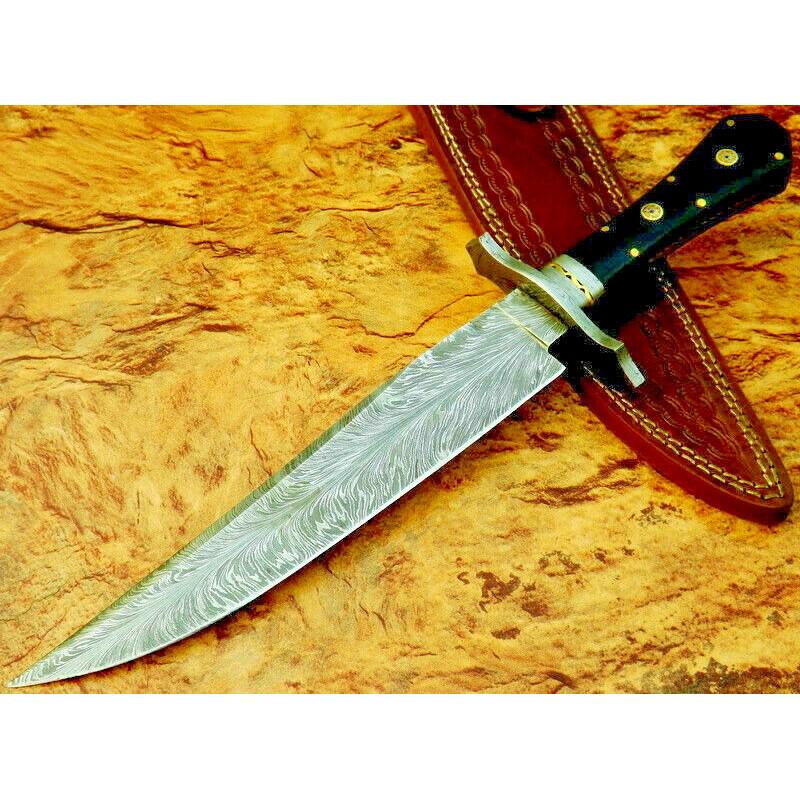 Damascus steel knife,with cow hide, black micarta: Knife "Trader" made of damask steel. Handle – black micarta, brass, mosaic, scabbard - cow hide. Damascus knives are very durable, look great and keep sharpness perfectly. Damascus steel has high qu