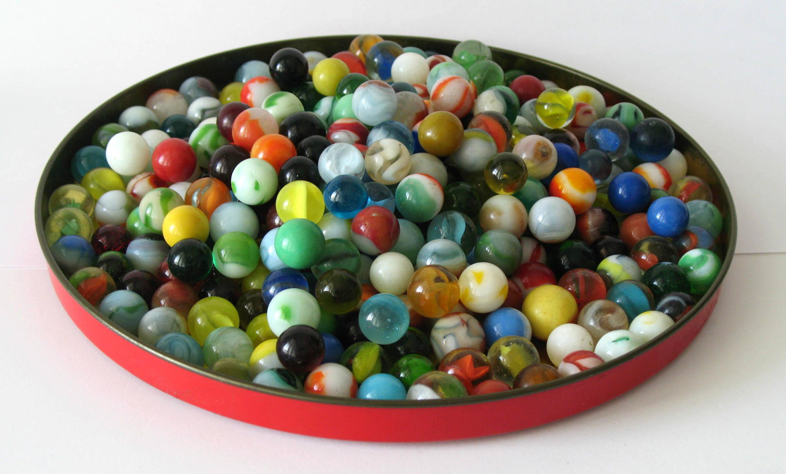 Vintage glass marbles.: Title: Vintage glass marbles. Description: Nice collection of over 300 vintage glass marbles in good condition. Dimension: normal size Circa: 1940's Shipping: Domestic: Flat-rate of $20.00 to anywhere