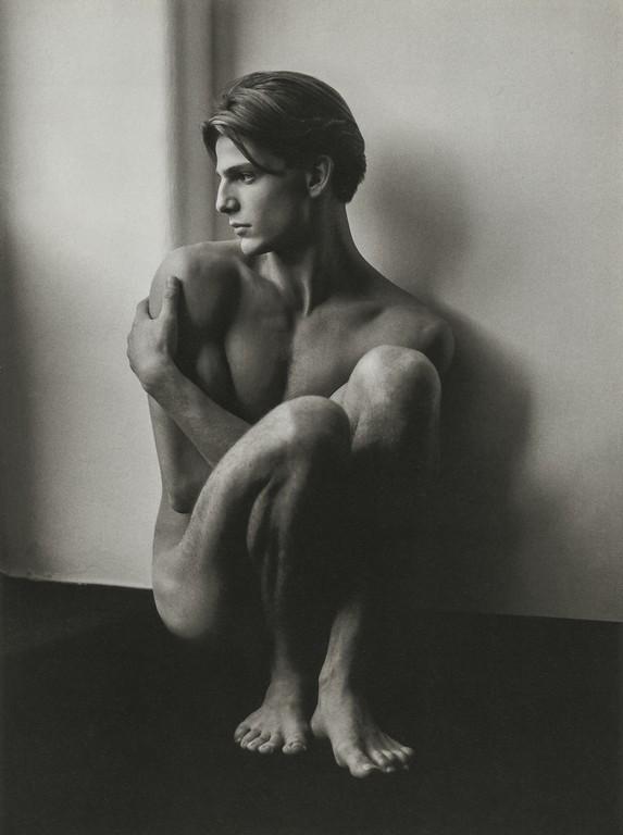 HERB RITTS - Stephano, Seated, Milan, 1985: Artist: HERB RITTS Title: Stephano, Seated, Milan, 1985 Medium: Photo Litho, 1999, France Dimensions: 7x9.4" Description: Heat Wax Mounted on 11x14" Conservation Board Artist Bio: Herb Ritts (1952-200