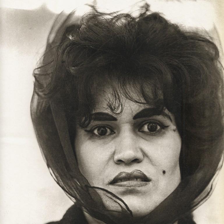 DIANE ARBUS - Puerto Rican Woman with Beauty Mark, NYC: Artist: DIANE ARBUS Title: Puerto Rican Woman with Beauty Mark, NYC, 1965 Medium: Photo Litho, 1972, USA Dimensions: 8.2x8.2" Description: Heat Wax Mounted on 11x14" Conservation Board Artist Bio: Dia