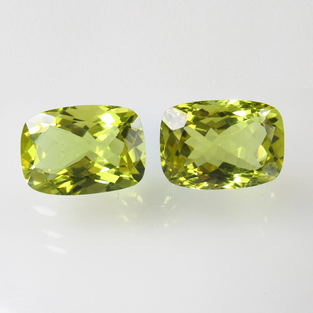 13.87 Ct Natural Lemon Quartz Cushion Pair: Title: 13.87 Ct Natural Lemon Quartz Cushion Pair Stone Clarity: VVS Gemstones: Natural Lemon Quartz Carat Weights: 13.87 Size/Dimensions: 14.00 x 10.00 x 8.00 mm / 2 PC's Additional Information: Good