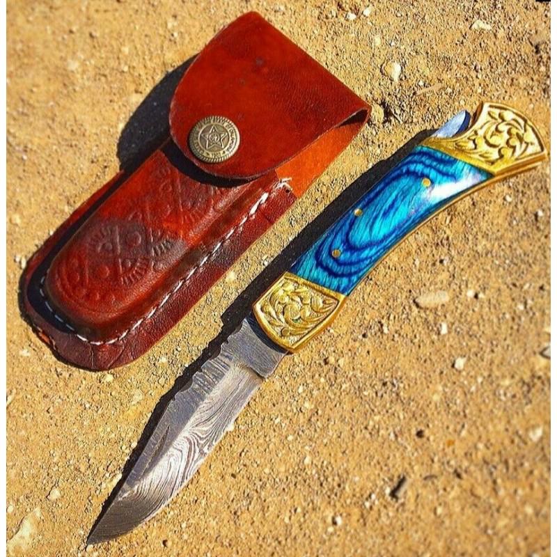 Damascus steel knife, leather sheath, wood handle with: Knife "Blood" made of damask steel. Handle – wood with brass accents, scabbard - leather. Damascus knives are very durable, look great and keep sharpness perfectly. Damascus steel has high quality c