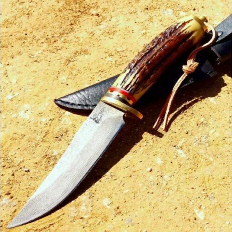 Damascus steel knife, high quality, leather sheath,: Knife "Bone" made of damask steel. Handle – bone, scabbard - leather. Damascus knives are very durable, look great and keep sharpness perfectly. Damascus steel has high quality contents to give it a