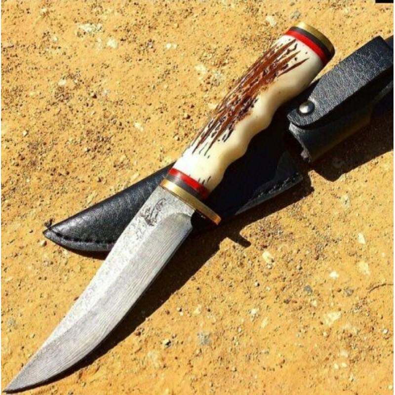 Damascus steel knife, leather sheath, bone handle,: Knife "Rbone" made of damask steel. Handle – bone, scabbard - leather. Damascus knives are very durable, look great and keep sharpness perfectly. Damascus steel has high quality contents to give it 