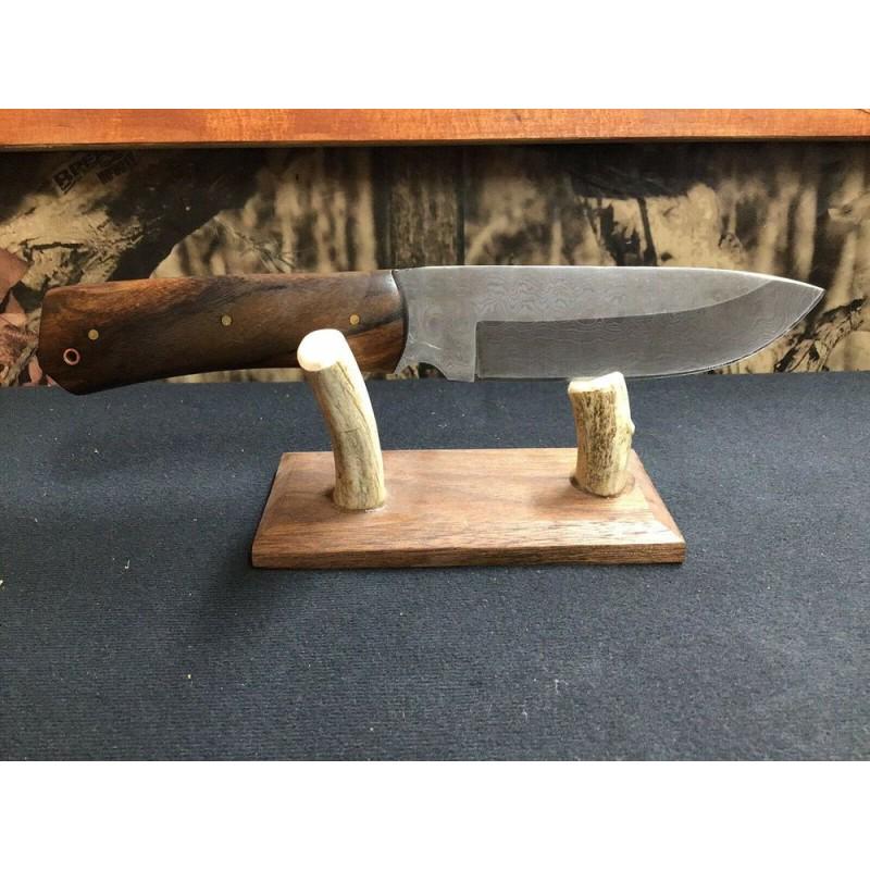Damascus steel knife, leather sheath, walnut handle,: Knife "Nut" made of damask steel. Handle Â– walnut, scabbard - leather. Damascus knives are very durable, look great and keep sharpness perfectly. Damascus steel has high quality contents to give i