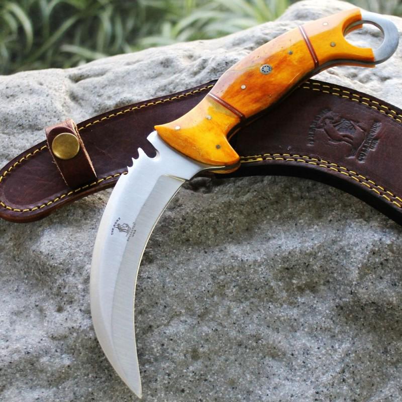 Steel karambit knife, leather sheath, yellow bone: Knife "Beast bone" made of steel. Handle – yellow bone, scabbard - leather. Steel knives are very durable, look great and keep sharpness perfectly. This steel has high quality contents to give it an