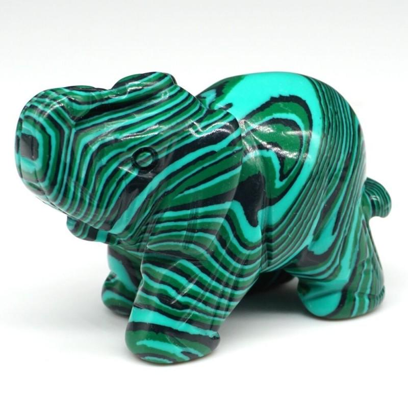 Green Taiwan Turquoise Quartz Carved Elephant Figurine: Green Elephant Taiwan Turquoise Quartz The elephant is a symbol of love, an ancient and useful animal. The elephant is a symbol of moderation, compassion, eternity, supreme power. Quartz - one of the